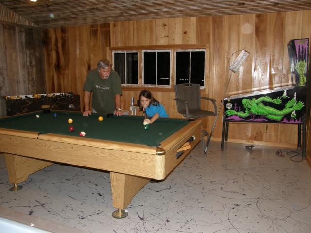 learning to shoot pool from Uncle Jay