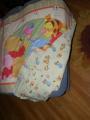 Baby Pooh quilt matches burp cloths