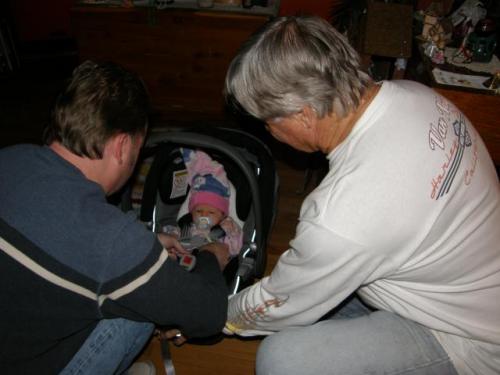 Daddy and Grandpa fixing my carseat