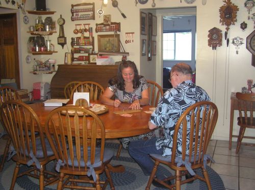 Peggy and Daddy playing cribbage