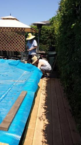 Joey and Shane repairing pool deck
